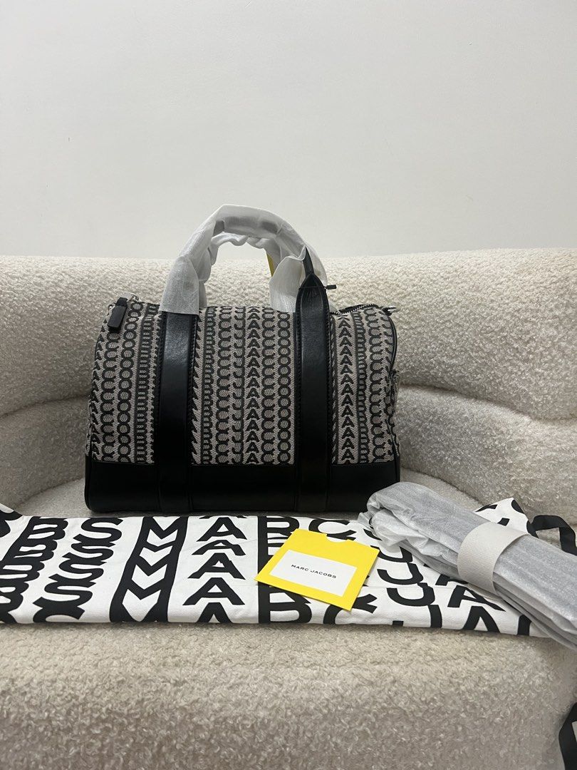 Marc Jacobs Duffle Bag Jacquard (Category: Luxury Bags & Wallets) located in Pinili. Submitted by ___bagsssandsstyle (Listing ID 1438534040, Image 1). Description: Original No flaw Complete.