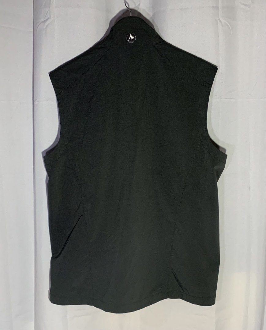 Marmot Vest (Category: Vests) located in Quezon. Submitted by ken2x_thrift (Listing ID 1438544374, Image 2). Description: - Marmot vest - Full zip closure - Two front pockets - Stand-up collar - Sleeveless design - Solid color - Marmot logo on front and back - Lined.