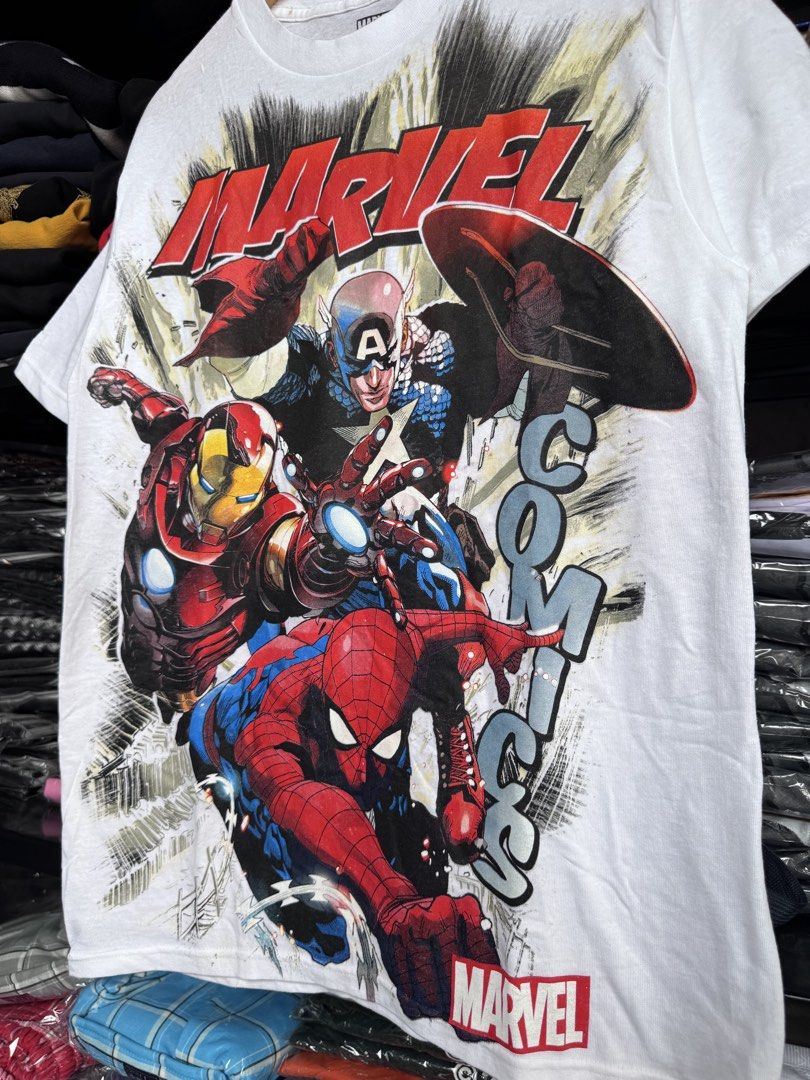 Marvel Comics T-shirt - Medium (Category: Tshirts & Polo Shirts ) located in Pasig City. Submitted by dripthrift1600 (Listing ID 1438533216, Image 3). Description: - Marvel Comics t-shirt - Features Iron Man, Captain America, and Spider-Man - Size: Medium - Dimes: 20x29 - Material: 100% Cotton - Made in Mexico - Brand: C-Life Group Ltd..