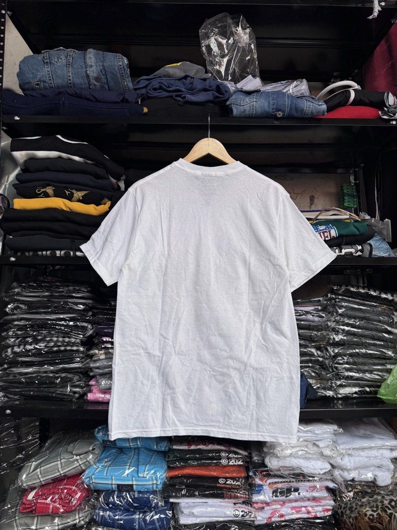 Marvel Comics T-shirt - Medium (Category: Tshirts & Polo Shirts ) located in Pasig City. Submitted by dripthrift1600 (Listing ID 1438533216, Image 2). Description: - Marvel Comics t-shirt - Features Iron Man, Captain America, and Spider-Man - Size: Medium - Dimes: 20x29 - Material: 100% Cotton - Made in Mexico - Brand: C-Life Group Ltd..