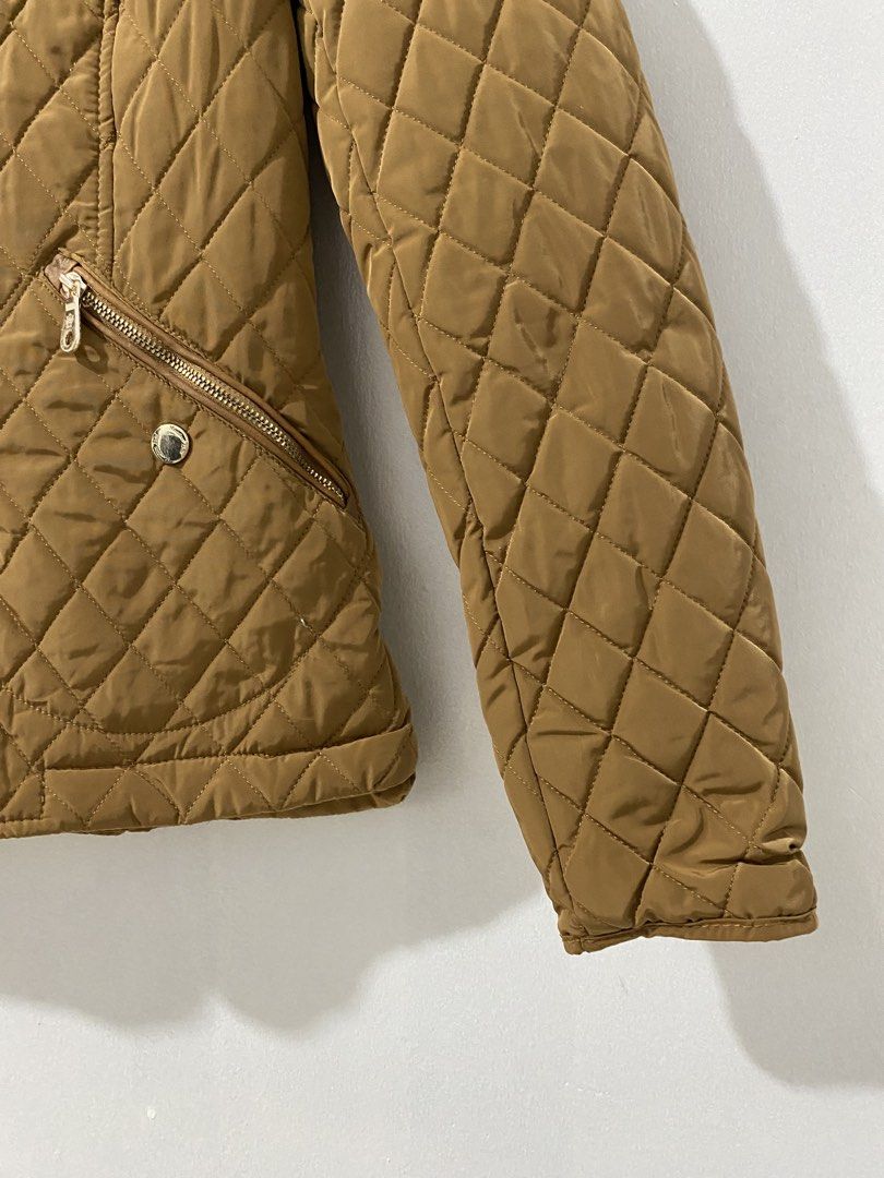 Massimo Dutti Quilted Jacket (Category: Coats, Jackets and Outerwear) located in Pasay City. Submitted by ralphorhtej (Listing ID 1438657979, Image 2). Description: - Massimo Dutti quilted jacket - Stand-up collar with button closure - Two zippered pockets - Stylish diamond pattern - Elegant brown color - Comfortable brown lining - Secure zipper closure.