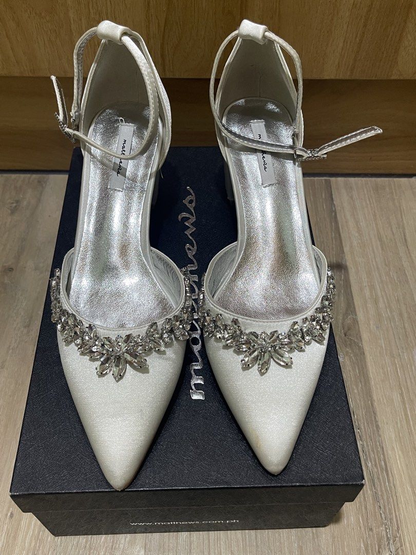 Matthews Gianni Heel Pumps - Size 38 (Category: Heels) located in Manila. Submitted by senesce (Listing ID 1438572121, Image 1). Description: - Gianni heel pumps by Matthews - Size 38 -very elegant and comfy Used once for wedding - Pointed toe design - Crystal embellishments - Ankle strap - Comes with original box - Minor stain present.
