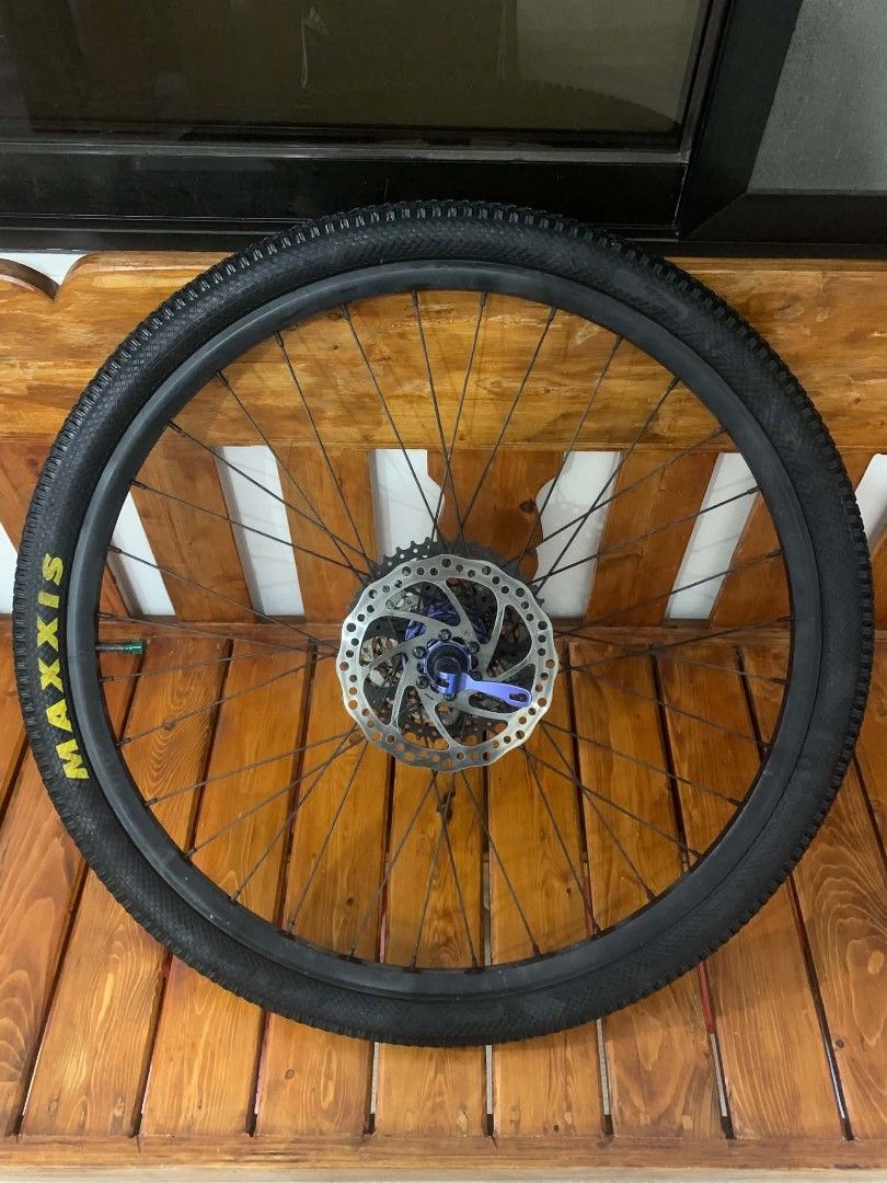 Maxxis Bike Wheel with Disc Brake (Category: Bicycles) located in Manila. Submitted by aukitten (Listing ID 1438558234, Image 1). Description: Wheelset 26r for sale! 3,500 negotiable pa Tires: Maxxis Race 26X1.95 65 psi Rim: Trinx Lightweight Spokes: unknown Cogs: VG sports 11:42 Hubs: weapon savage hubs 6 pawls Rotor: unknown 160mm.