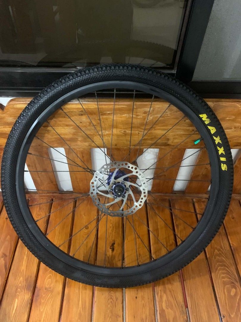 Maxxis Bike Wheel with Disc Brake (Category: Bicycles) located in Manila. Submitted by aukitten (Listing ID 1438558234, Image 2). Description: Wheelset 26r for sale! 3,500 negotiable pa Tires: Maxxis Race 26X1.95 65 psi Rim: Trinx Lightweight Spokes: unknown Cogs: VG sports 11:42 Hubs: weapon savage hubs 6 pawls Rotor: unknown 160mm.