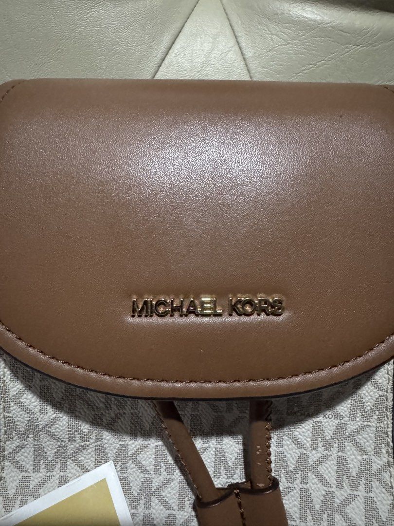 Michael Kors Mini Back PAck (Category: Backpacks) located in Makati City. Submitted by wellLovedstuffs (Listing ID 1438543077, Image 2). Description: Check the pictures please.