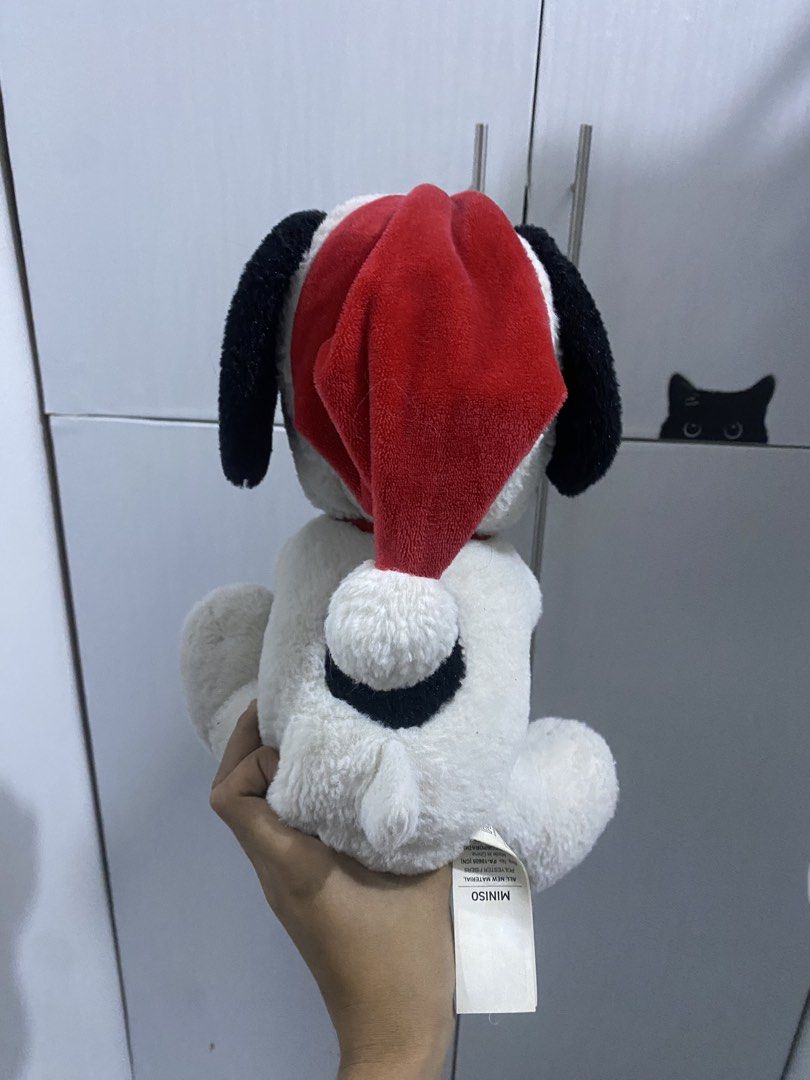 Miniso Snoopy Christmas Plush Toy (Category: Plushies & Soft Toys) located in Valenzuela. Submitted by crabncorn (Listing ID 1438634268, Image 3). Description: - Miniso Snoopy plush toy - Christmas-themed: Snoopy in Santa hat and holding a candy cane - Soft, white plush material - Features black ears and red collar - Size: 11 inches - Great gift idea!.