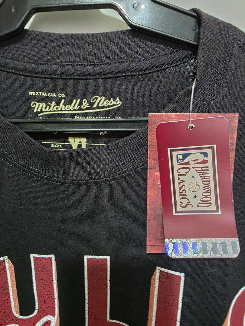 Mitchell & Ness Chicago Bulls T-shirt (Category: Tshirts & Polo Shirts ) located in Makati City. Submitted by chris_angle (Listing ID 1438619930, Image 2). Description: Mitchell & Ness Chicago Bulls T-shirt - Black color - Size: XL - NBA Hardwood Classics tag - Bulls logo on front Meetup in Uptown Mall or Starbucks Avida Verte Shipping can be arranged once payment is confirmed. Shipping fee to be charged to buyer. Payment - BPI, GCash or Maya.