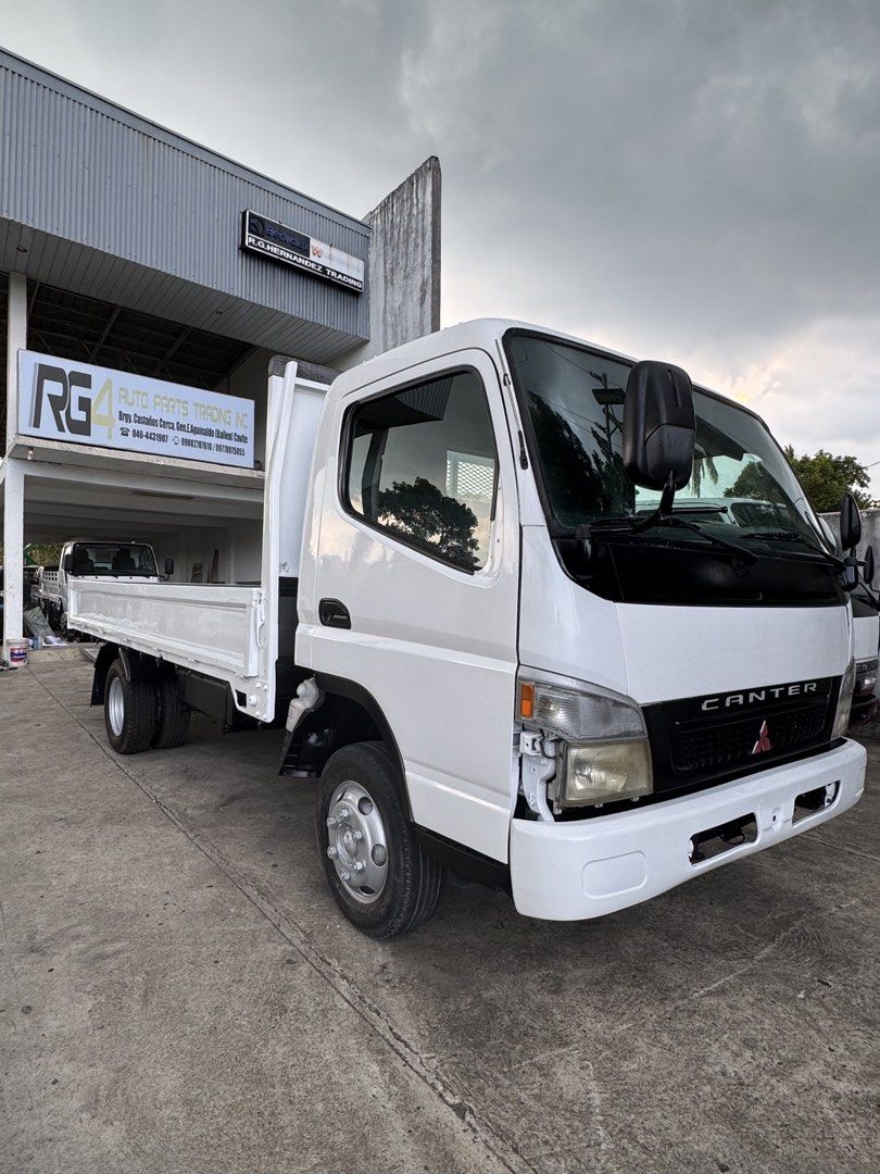 Mitsubishi Fuso Canter Dropside (Category: Heavy Vehicles) located in General Emilio Aguinaldo. Submitted by rghernandez.trading (Listing ID 1438627734, Image 1). Description: Reconditioned Fresh Japan 🇯🇵 Surplus Mitsubishi Fuso Canter Wide 4M51 Engine 14 ft. Dropside Leaf Spring (molye) Drum Brake (front & rear) 6 Studs Cash / Financing ☎️046-4431907 ☎️046-4235872 📱0908-2707610 📱0977-8075055 .