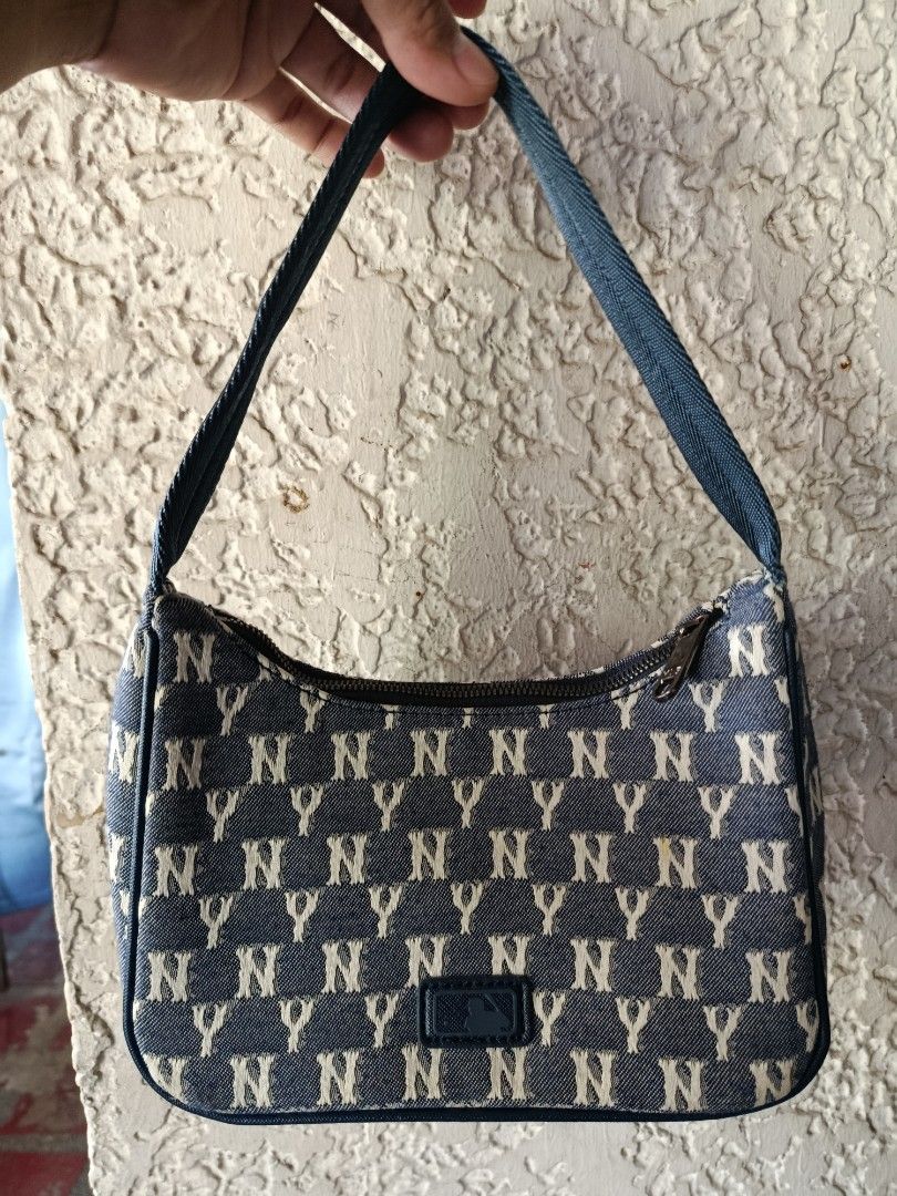 MLB New York Yankees monogram hobo bag (Category: Shoulder Bags) located in Manila. Submitted by totomemeh_okeyukay.2023 (Listing ID 1438505646, Image 2). Description: MLB New York Yankees monogram hobo bag...good condition 10/10 colorate need wash price is still negotiable just DM me.