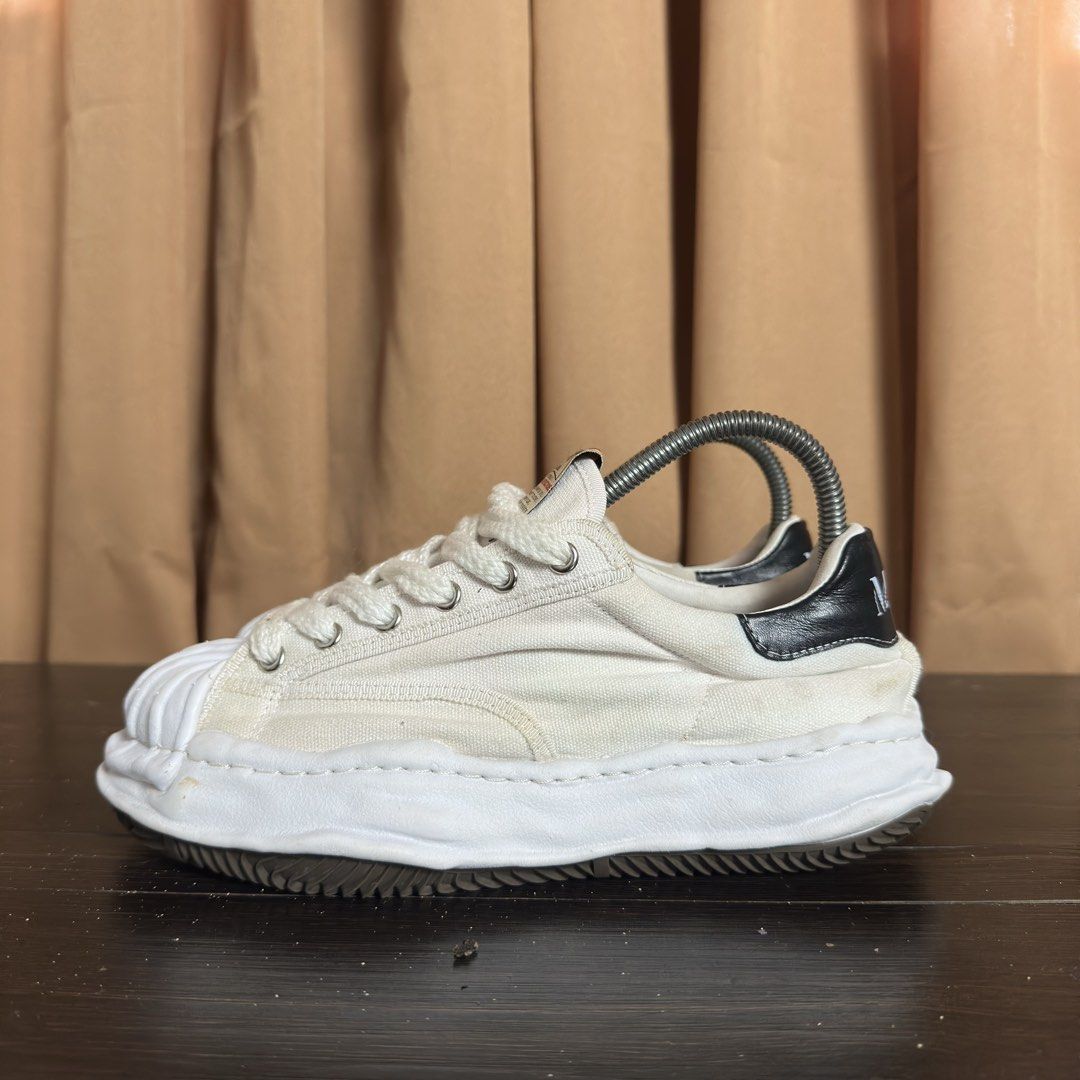 MMY Maison Mihara Yasuhiro Sneakers (Category: Sneakers) located in Don Carlos. Submitted by rabearcelj59593 (Listing ID 1438610837, Image 3). Description: - MMY Maison Mihara Yasuhiro sneakers - Off-white color - Unique textured sole and toe cap - Low-top design - Canvas upper - Lace-up closure - Brand logo on tongue - Black heel accent.