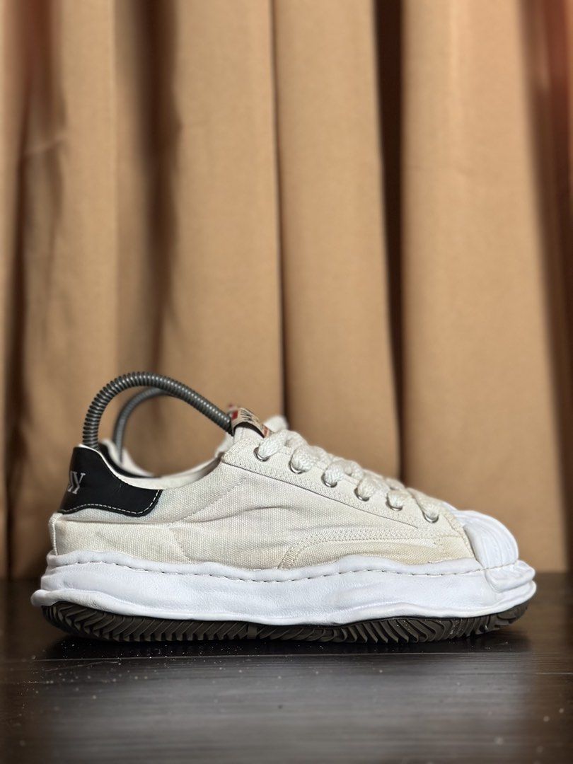 MMY Maison Mihara Yasuhiro Sneakers (Category: Sneakers) located in Don Carlos. Submitted by rabearcelj59593 (Listing ID 1438610837, Image 1). Description: - MMY Maison Mihara Yasuhiro sneakers - Off-white color - Unique textured sole and toe cap - Low-top design - Canvas upper - Lace-up closure - Brand logo on tongue - Black heel accent.