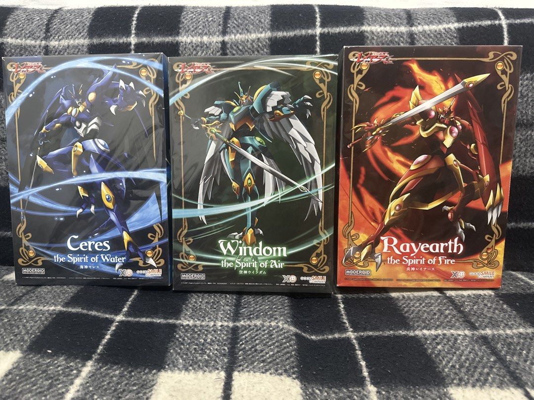 MODEROID Rayearth Ceres Windom Trading Card Game (Category: Raw Singles) located in Pasay City. Submitted by otaku_shop_by_nanami.chan (Listing ID 1438678544, Image 1). Description: - PM lng po - Sold as Set only - Set of three MODEROID trading card game boxes. - Features Ceres (Spirit of Water), Windom (Spirit of Air), and Rayearth (Spirit of Fire). - Each box has unique artwork. - Boxes appear to be sealed. - Perfect for collectors and fans..