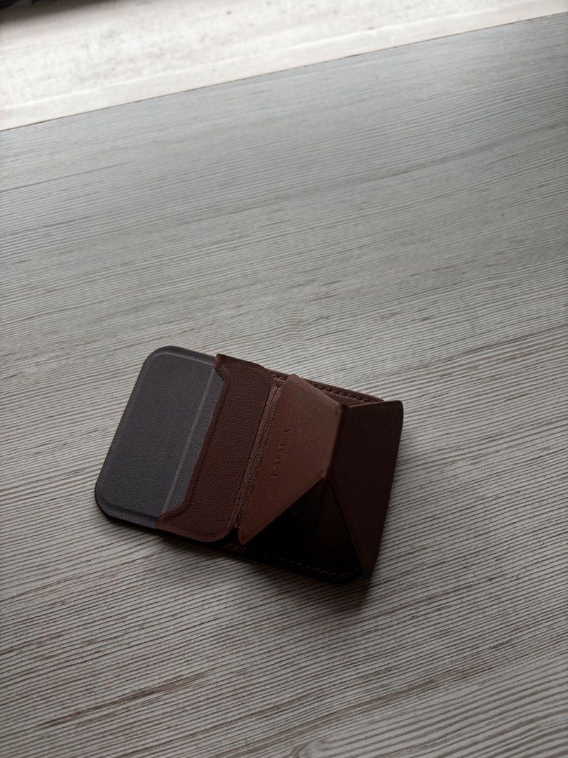 Moft snap phone stand and wallet (brownie) (Category: Other Mobile & Gadget Accessories) located in Pasig City. Submitted by patsales_ (Listing ID 1438691262, Image 3). Description: Used very lightly. No issues .