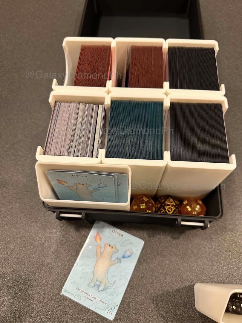 MTG Standard Deck Box Organizer Magic the Gathering Storage (Category: Trading Cards Accessories) located in Manila. Submitted by galaxyph (Listing ID 1438660269, Image 3). Description: Fits ✨6 x MTG Standard Decks ✨2 x Extra Compartments for Tokens/ Spare Cards ✨Designed for Sleeved and Unsleeved decks ✨This is a customize product, requires 50% down payment 🙂 Ships in 2-3 days. Also available on my online 💙 blue and 🍊 orange app.