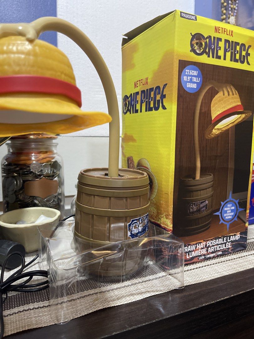 Netflix One Piece Straw Hat Posable Lamp (Category: Character Goods) located in Cabuyao City. Submitted by jnnyz (Listing ID 1438628489, Image 3). Description: - One Piece Straw Hat Posable Lamp - USB Powered Light - Features a barrel-shaped base - Stands 27.6cm tall - Limited Edition - Netflix.
