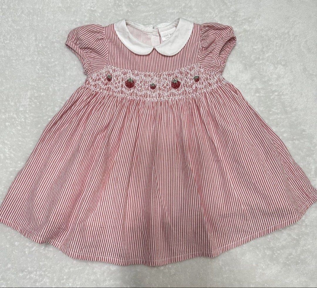 Next Strawberry Embroidered Dress (Category: Babies & Kids Fashion) located in Pasig City. Submitted by summermid (Listing ID 1438515643, Image 1). Description: - Red and white striped dress - Strawberry embroidery - White collar - Short sleeves - Full skirt - Lightweight fabric - Perfect for warm weather - Classic, sweet design.