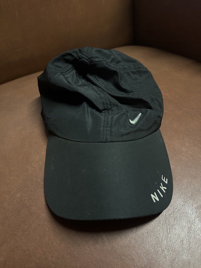 Nike Black Cap (Category: Caps & Hats) located in Manila. Submitted by clamchowder19 (Listing ID 1438546780, Image 1). Description: - Black Nike cap - Made of 100% polyester - Nike logo on the front - "NIKE" on the brim - Adjustable fit - Made in China.
