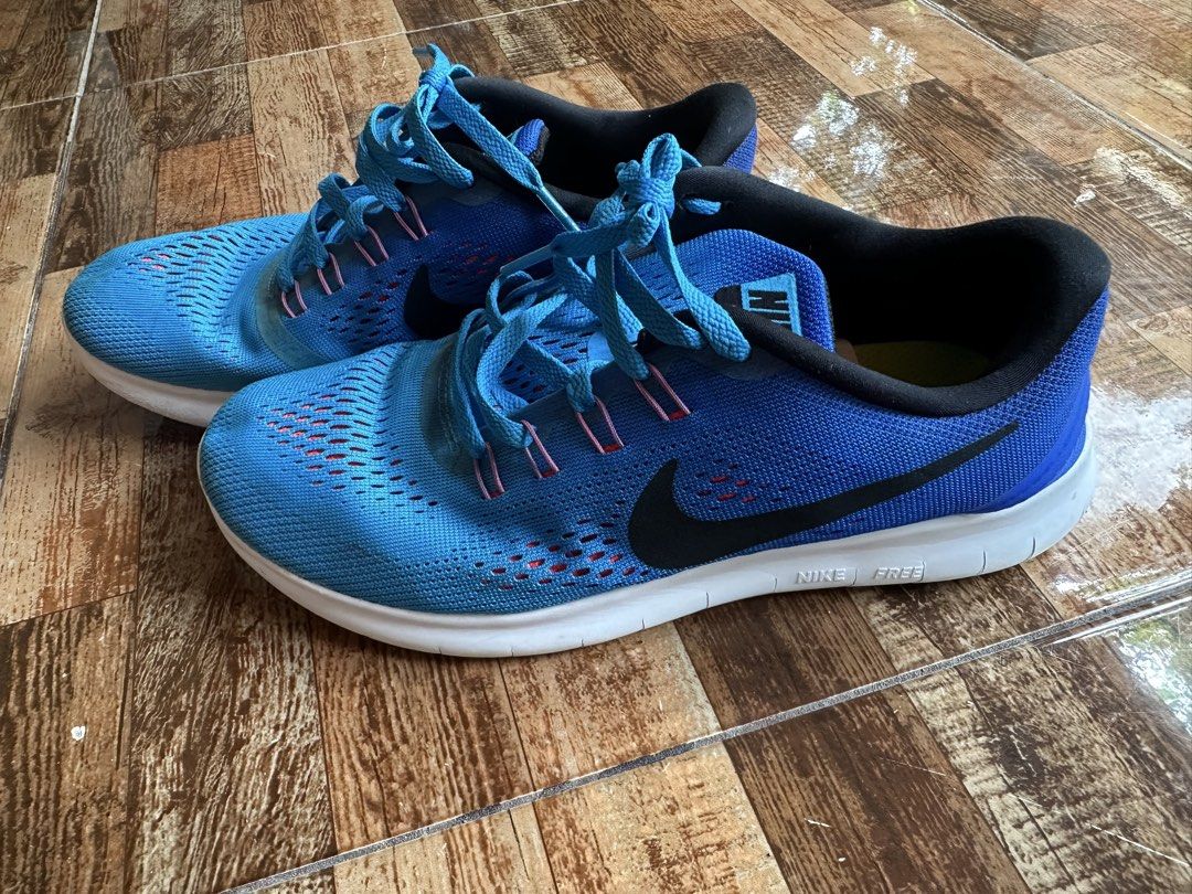 Nike Free RN Blue Running Shoes (Category: Sneakers) located in Digos. Submitted by venusacaro13427 (Listing ID 1438563241, Image 3). Description: - Blue Nike Free RN running shoes - Breathable mesh upper - White sole - Nike swoosh logo on the side - Blue laces - Black interior - Good sole condition - Designed for flexibility and comfort.