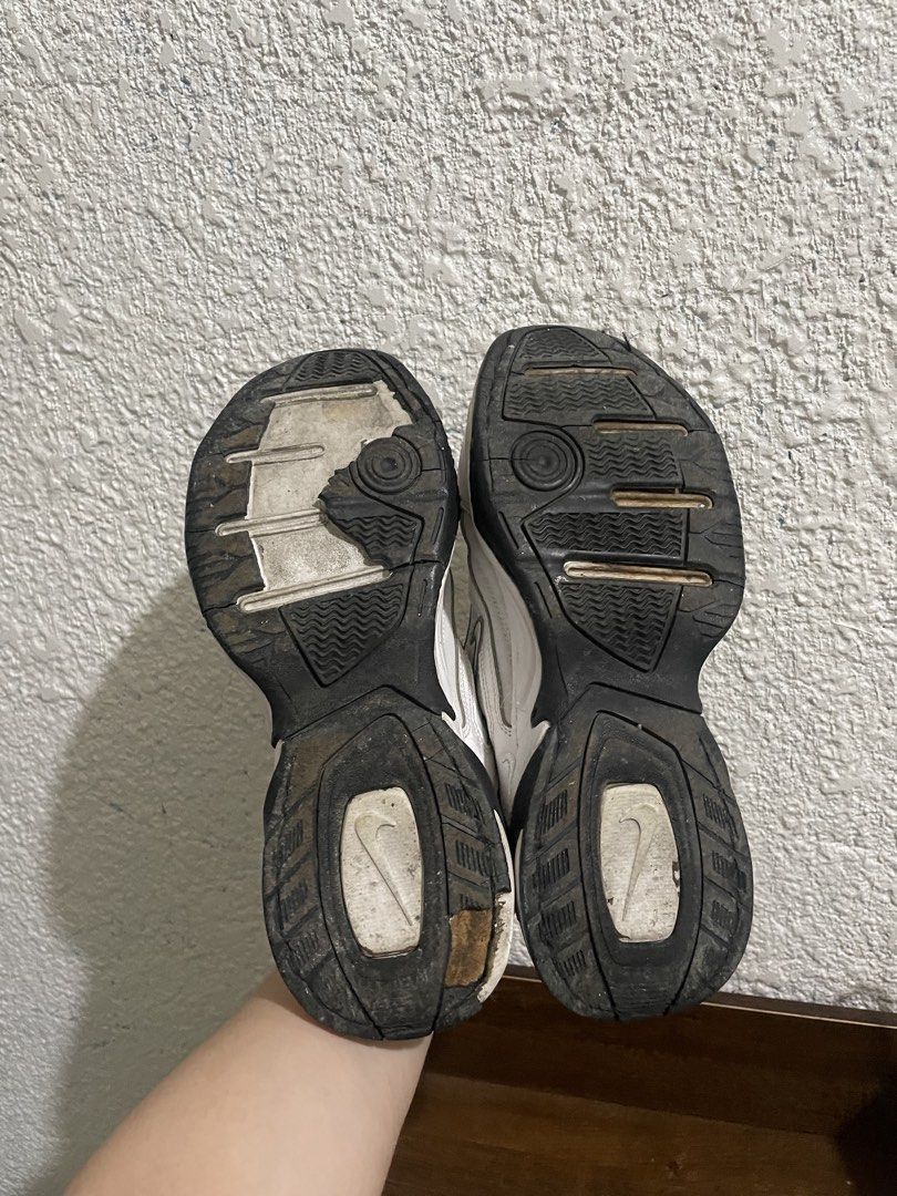 Nike M2K Tekno White Sneakers (Category: Sneakers) located in Bacoor. Submitted by soberity (Listing ID 1438606664, Image 3). Description: - Nike M2K Tekno sneakers - Color: White upper with black and gold accents - Condition: Used, with visible wear on soles - Features: White laces, Nike swoosh logo, heel pull tab - Insole condition visible in photos.