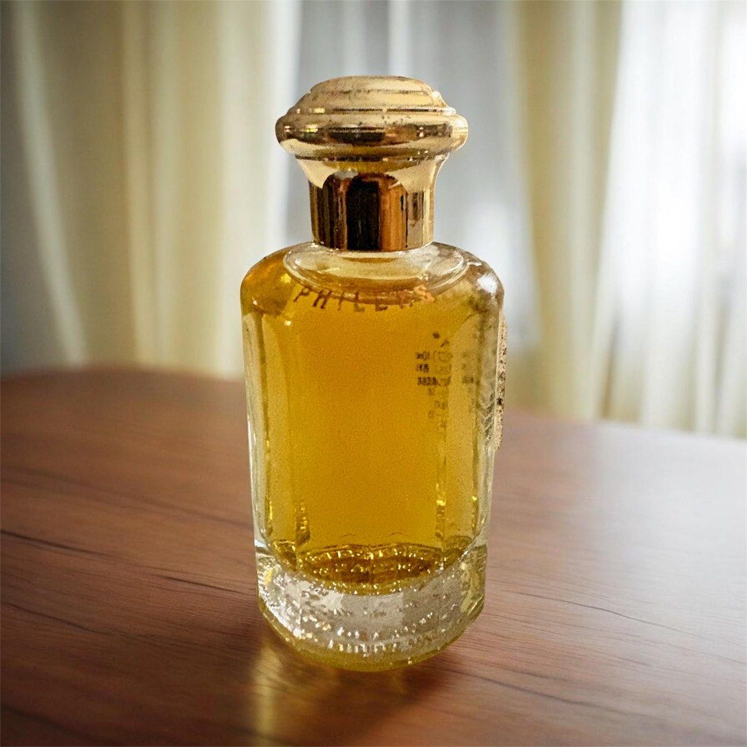 Nina Ricci Phileas Perfume (Category: Fragrance & Deodorants) located in Cebu City. Submitted by banonggio (Listing ID 1438585275, Image 1). Description: -Phileas perfume bottle - Gold-colored cap - Clear glass body - Amber-colored perfume - Unique textured base design - almost full - discontinued perfume by nina ricci.