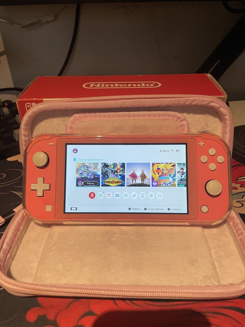 (Negotiable) Nintendo Switch Lite Coral pink (Category: Nintendo) located in Manila. Submitted by juszt (Listing ID 1438540607, Image 2). Description: Read first! Nintendo switch lite coral pink Good condition pwede pang gift Inclusion: Box Nintendo charger Jelly case Tempered glass Pink pouch Price: 7k negotiable North caloocan area Or i can deliever personally sa malayo (minimal df).