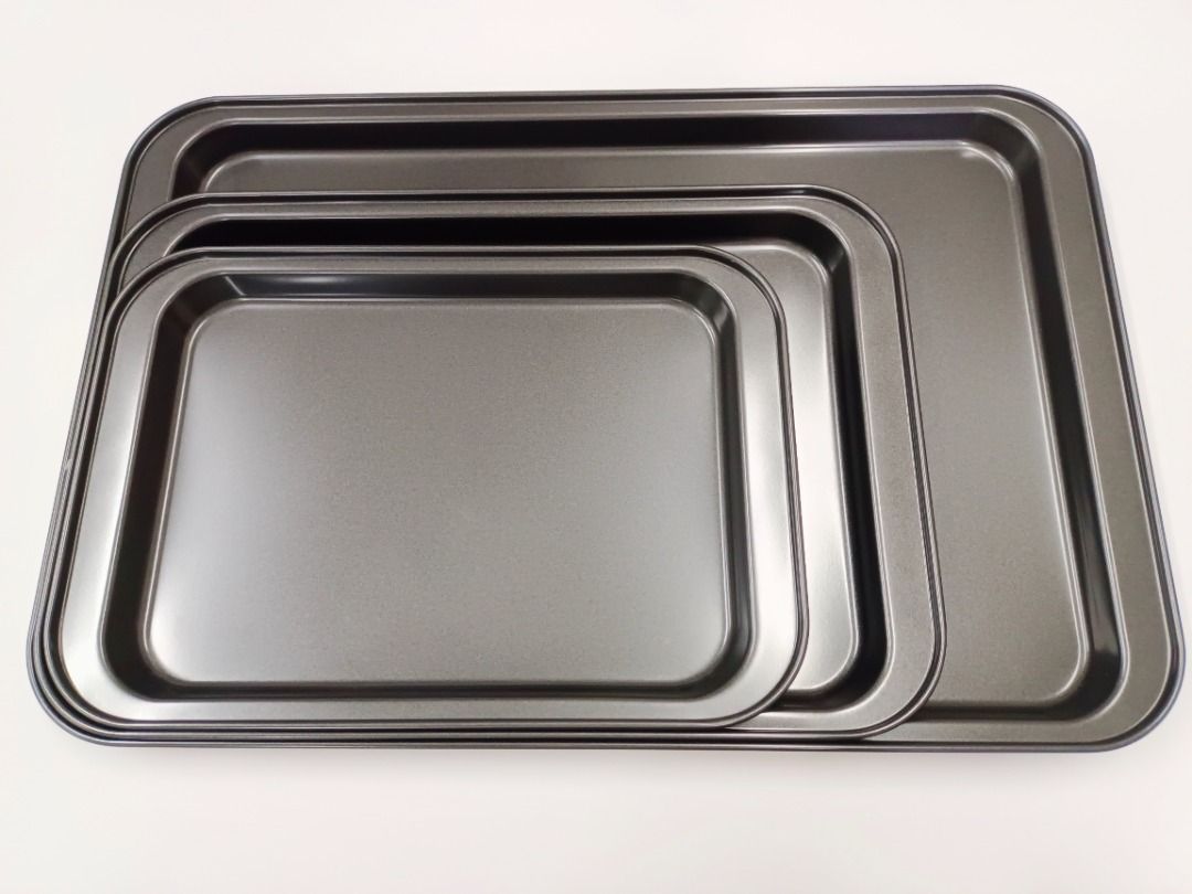 Non Stick Cookie Flat Sheet Baking Pan (Category: Bakeware) located in Quezon City. Submitted by inter_active_megawares (Listing ID 1438570351, Image 2). Description: Non Stick Cookie Flat Sheet Baking Pan IAC-139 - Small Price: P150.00 Weight:240g OUTER MEASUREMENTS Length:31.5cm/12.4" Width:22cm/8.6" Height:2.5cm/1" INNER MEASUREMENTS: Inner Top:26.5x19.5cm Inner Bottom:25.5x18cm IAC-140 - Medium Price: P175.00 Weight:340g OUTER DIMENSIONS Leng