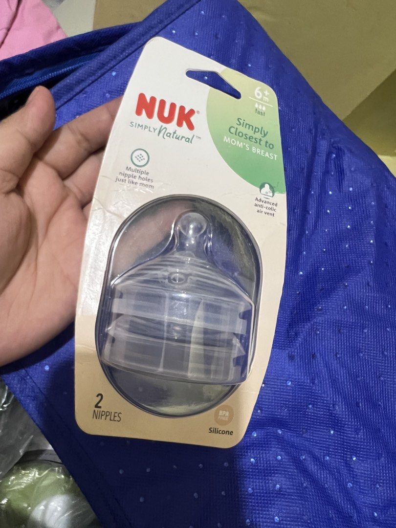 NUK Simply Natural Nipples (Category: Breastfeeding & Bottle Feeding) located in Manila. Submitted by chiiiiing2 (Listing ID 1438529691, Image 1). Description: - NUK Simply Natural Nipples - Designed to be closest to mom's breast - Features multiple nipple holes - Advanced anti-colic air vent - Includes 2 nipples - Made of silicone - Suitable for babies 6+ months.