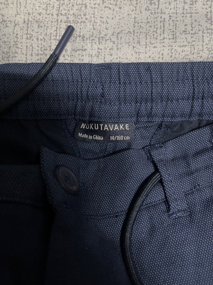 NUKUTAVAKE Navy Blue Pants 14/160cm (Category: Other Bottoms) located in Quezon City. Submitted by listless32 (Listing ID 1438690815, Image 3). Description: Waist 28 - 29 L is 37 Navy blue NUKUTAVAKE pants. Size 14/160cm. Features drawstring waist and two back pockets. Made in China..