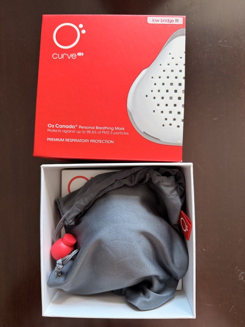 O2 Canada Curve Personal Breathing Mask (Category: Everything Else Others) located in Quezon City. Submitted by charmerchant (Listing ID 1438602919, Image 2). Description: - O2 Canada Curve Personal Breathing Mask - Includes mask, carrying pouch, and replacement filters - Mask color: White with black trim - Protects against up to 98.6% of PM2.5 particles - Filters are original and made in China Used only 1x then kept.
