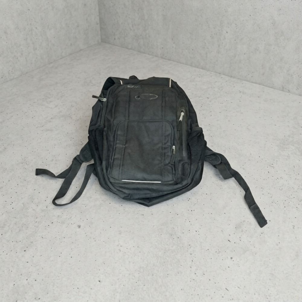Oakley Black Utility Tactical Backpack / Small Laptop Bag - Durable Design (Category: Backpacks) located in Paranaque City. Submitted by thepopneverstops (Listing ID 1398752239, Image 1). Description: Black utility tactical backpack with durable design. Features multiple compartments including laptop sleeve. Practical for work, travel, or outdoor activities. ❌video ❌when worn pics ❌lowball ❌cod Tags: tactical backpack, utility bag, laptop bag, bl