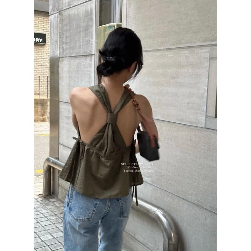 Olive Green Halter Top (Category: Sleeveless) located in Quezon City. Submitted by _dcluttering (Listing ID 1438677211, Image 2). Description: - Stylish olive green halter top - Flattering V-neckline - Unique back design - Gathered detail under bust - Slightly flared hem - Lightweight fabric - Perfect for casual and chic looks.