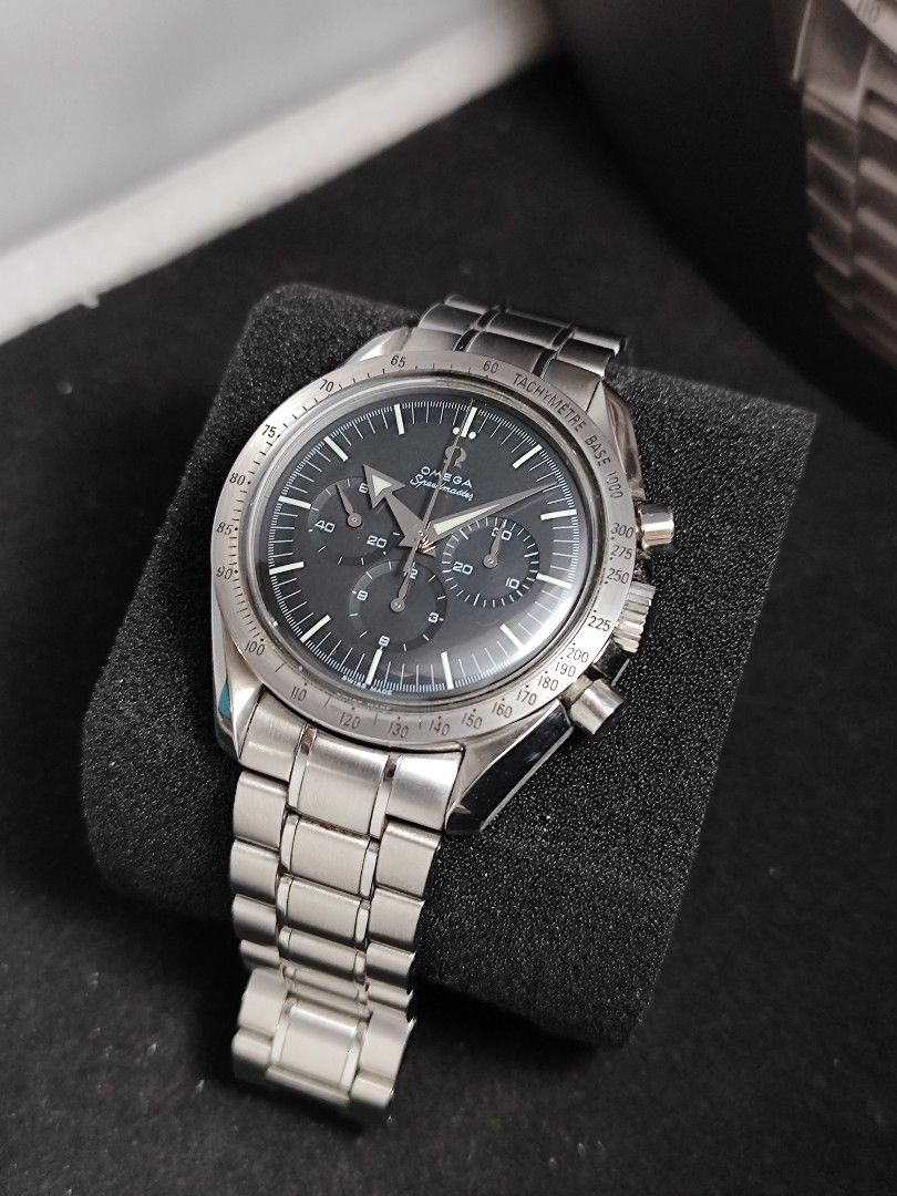 Omega Speedmaster Broad Arrow 42mm (Category: Men's Watches) located in San Juan City. Submitted by MW_888 (Listing ID 1438630676, Image 3). Description: Omega Speedmaster Broad Arrow 42mm (aka Speedmaster '57) 6 year production only 1997-2003 Cal 1861 Manual wind (same movement as moonwatch) 2000, 77m serial Ref 3594.50 9/10 condition Inclusions: watch, original bracelet fit to approx 7" wrist, authentication receipt and watch case *original gla
