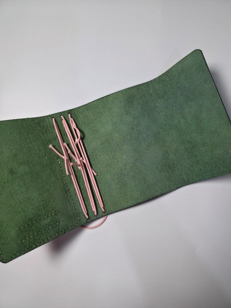 Passport size Handmade Leather Journal (Category: Stationery & School Supplies) located in Pasig City. Submitted by ajsssss (Listing ID 1438677317, Image 3). Description: 🌱 Passport Size Leather Journal Folio 🌱 🪡 Handmade - saddle stiched 🌸 3 set bronze grommet: can fit a total of 6 Passport sized paper refills 🌸 Main cover is Vegetable Tanned Malayan Leather, Pocket is Vegetable Tanned Textured Cow Leather 🔆 Order includes 2 Passport Size 