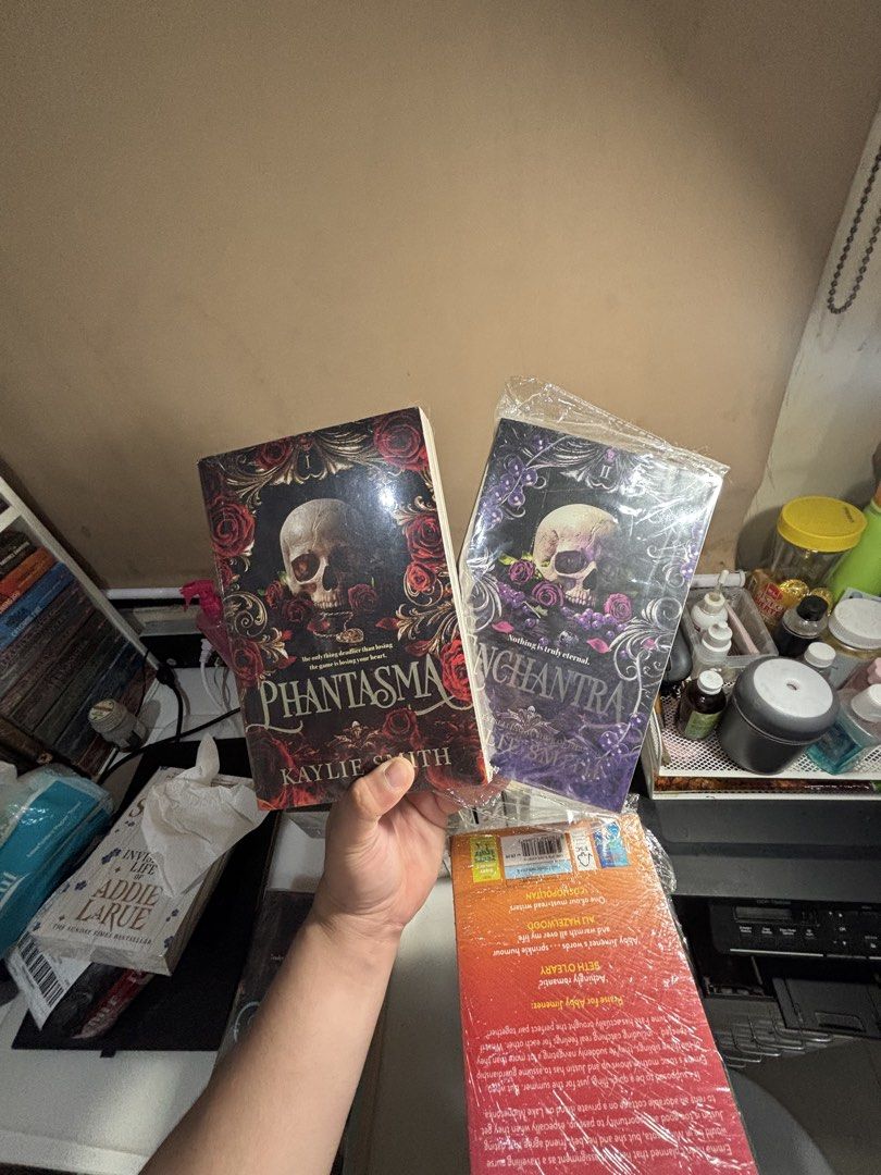 Phantasma and Wangchandra by Kaylie Smith (Category: Storybooks) located in Valenzuela. Submitted by kimmymaygarcia24 (Listing ID 1438660596, Image 1). Description: - Kaylie Smith books: "Phantasma" and "Wangchandra" - Condition: Good - Packaging: Plastic wrapped - Cover Art: Skull and roses - Language: English.