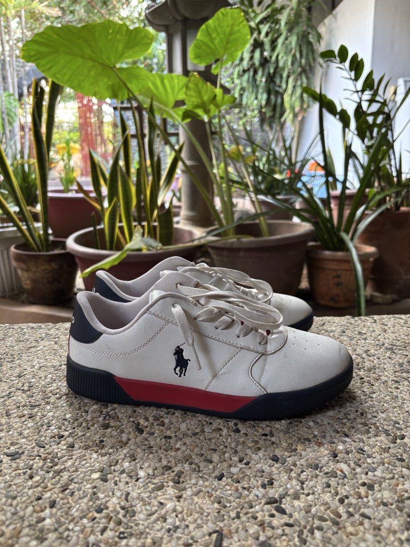 Polo Ralph Lauren White Sneakers (Category: Sneakers) located in Paranaque City. Submitted by chickenlexer (Listing ID 1438573079, Image 1). Description: - White Polo Ralph Lauren sneakers - Navy blue and red sole accents - Polo logo on the side - Size: US 5, UK 4.5, EUR 37, 24.5 cm.