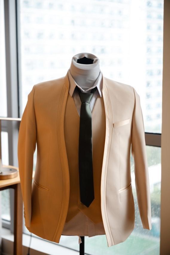 Preloved Beige Suit with Vest and Tie (Category: Coats, Jackets and Outerwear) located in Quezon City. Submitted by decluttrwithme (Listing ID 1438529697, Image 1). Description: - Elegant beige suit - Includes matching vest and dark green tie - Modern, tailored fit - Made of smooth, high-quality fabric - Ideal for weddings and formal events - Used Once - M-L body frame - Height 5’7 - Waist 36.