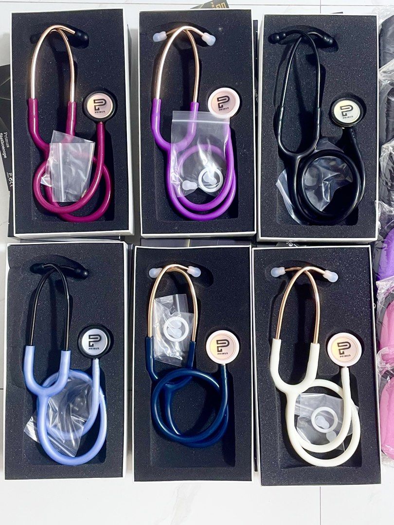 Primus Classic Series Stethoscope (Category: Medical Supplies & Tools) located in Manila. Submitted by ar_aguas08 (Listing ID 1438511578, Image 2). Description: Primus Classic Series stethoscopes available in various colors. Each stethoscope comes with a matching hard case and extra ear tips. The stethoscopes have a gold-colored chest piece and tubing. Available colors include black, blue, white, purple, pink, and maroon..