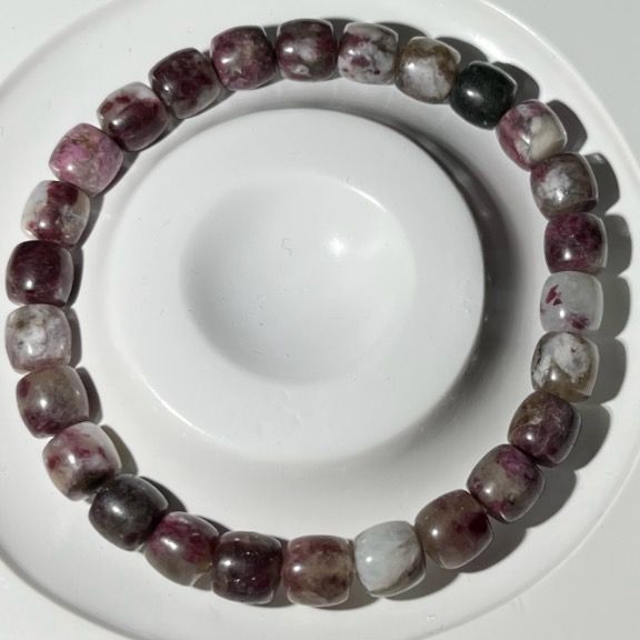 Purple Blossom Tourmaline (Category: Bracelets) located in Cebu City. Submitted by nancym1 (Listing ID 1438622529, Image 1). Description: Bead Size: 7mm Wrist Size: 16cm Natural stone. Also know as Plum Blossom tourmaline helps in releasing deep-seated trauma, clearing negative self-talk, and overcoming trust issues. It is often used to soothe anxiety and support conflict resolution. It also helps clear mental fog and enhances foresight and intui
