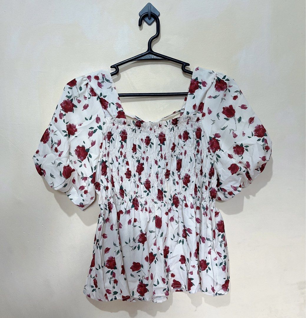 Red & White Floral Puff Sleeve Top (Category: Blouses) located in Quezon City. Submitted by dakiclutter (Listing ID 1438644617, Image 1). Description: Size: M to L • Full Smocked Please note that color may vary due to lighting 🚚 J&T, LBC, Lalamove, Grab Express 💳 Gcash, Maribank, Maya Schedule of shipment: Thursdays to Sundays.
