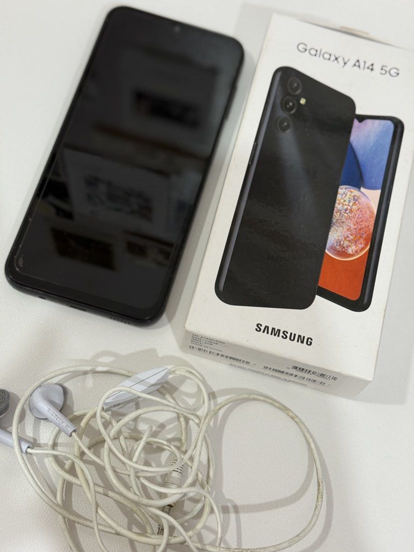 Samsung Galaxy A14 5g (Category: Samsung) located in Pasig City. Submitted by khaleisi (Listing ID 1438512769, Image 2). Description: Samsung Galaxy A 14 5g 6/128 no issue Free earphones With box No charger included.