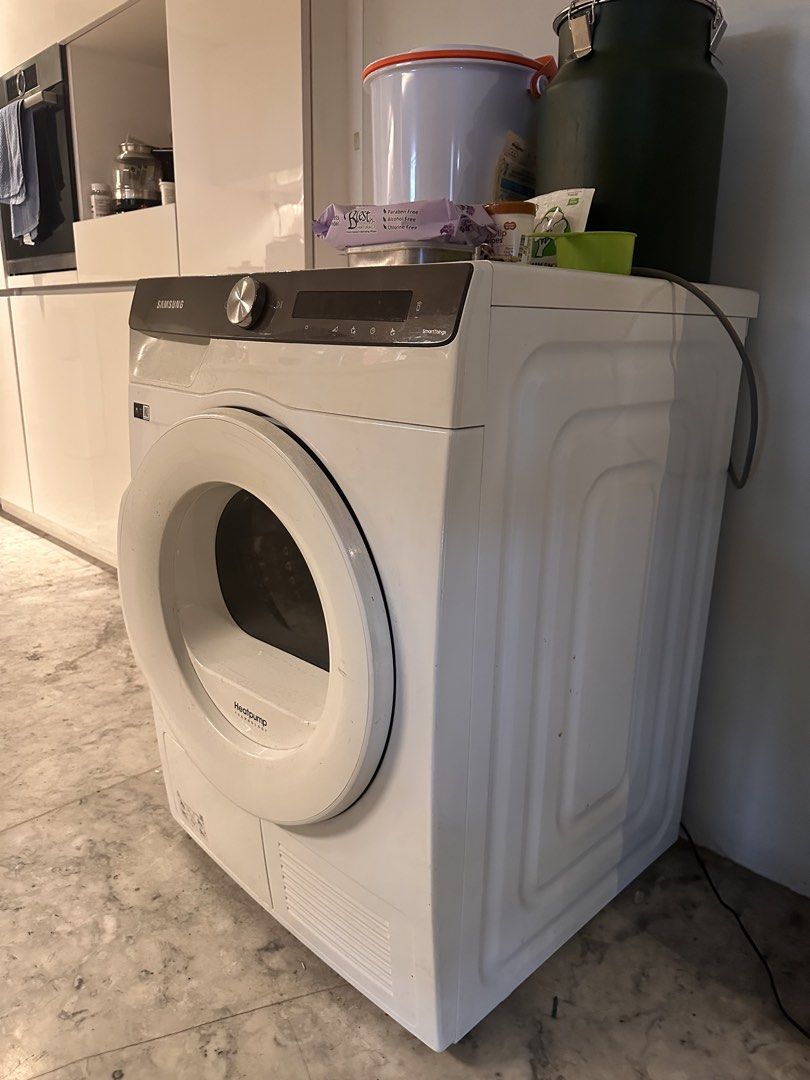 Samsung Heatpump Dryer (Category: Washing Machines and Dryers) located in Makati City. Submitted by mint___condition (Listing ID 1438586059, Image 2). Description: - Samsung Heatpump front load dryer - White body with dark grey control panel - Circular door - Digital display - Model: Heatpump.