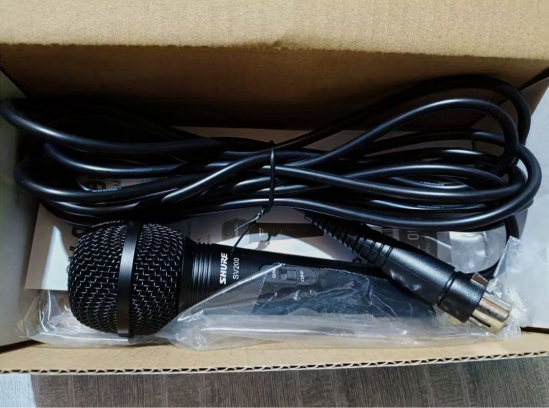 Shure SV200 Vocal Microphone (Category: Microphones) located in Davao. Submitted by missmaem (Listing ID 1438586715, Image 3). Description: - Shure SV200 vocal microphone - Great for lead/backup vocals, karaoke, and presentations - Includes 15" XLR to 1/4" cable - Black color - Comes with original box and documentation RFS: - Not compatible with our current speaker, na hindi talaga pang videoke - Decided to buy the JBL Partybox instead, with mic 