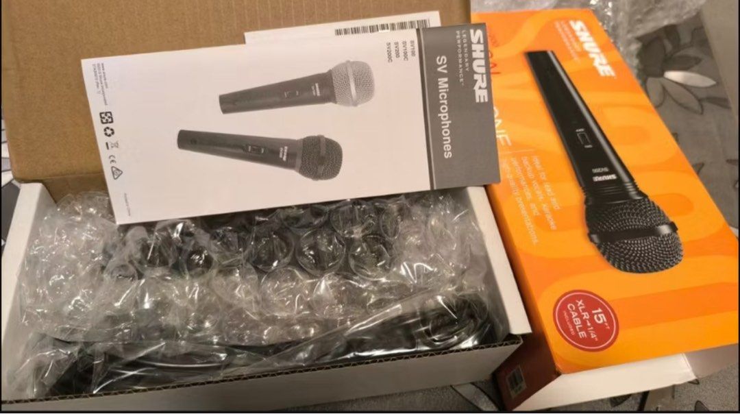 Shure SV200 Vocal Microphone (Category: Microphones) located in Davao. Submitted by missmaem (Listing ID 1438586715, Image 2). Description: - Shure SV200 vocal microphone - Great for lead/backup vocals, karaoke, and presentations - Includes 15" XLR to 1/4" cable - Black color - Comes with original box and documentation RFS: - Not compatible with our current speaker, na hindi talaga pang videoke - Decided to buy the JBL Partybox instead, with mic 