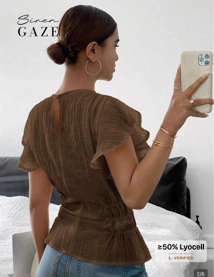 Siren Gaze Brown Top (Category: Sleeveless) located in Makati City. Submitted by ckfer (Listing ID 1438604338, Image 3). Description: - Siren Gaze brown top - Features: - Round neck - Short sleeves - Cinched waist - Material: At least 50% Lyocell - Perfect for a casual, stylish look..