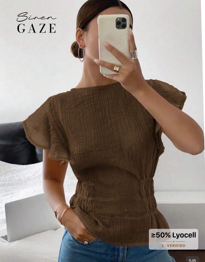 Siren Gaze Brown Top (Category: Sleeveless) located in Makati City. Submitted by ckfer (Listing ID 1438604338, Image 1). Description: - Siren Gaze brown top - Features: - Round neck - Short sleeves - Cinched waist - Material: At least 50% Lyocell - Perfect for a casual, stylish look..