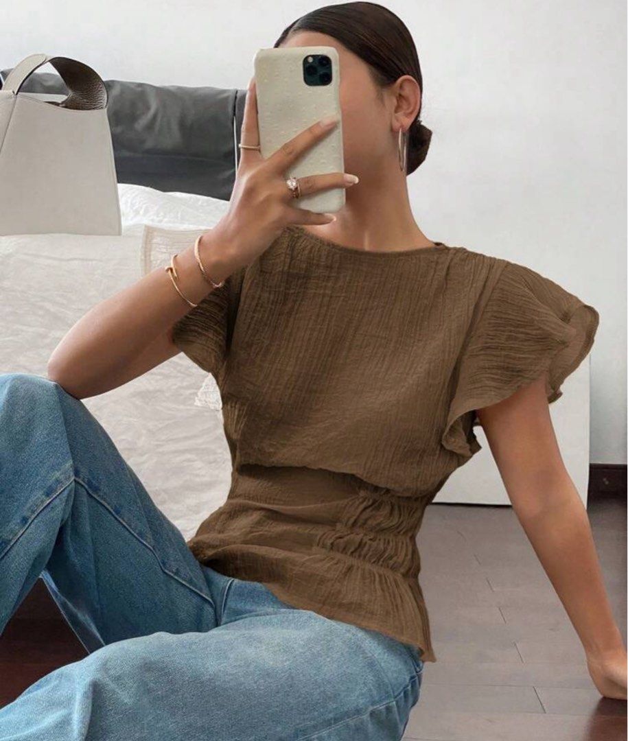 Siren Gaze Brown Top (Category: Sleeveless) located in Makati City. Submitted by ckfer (Listing ID 1438604338, Image 2). Description: - Siren Gaze brown top - Features: - Round neck - Short sleeves - Cinched waist - Material: At least 50% Lyocell - Perfect for a casual, stylish look..