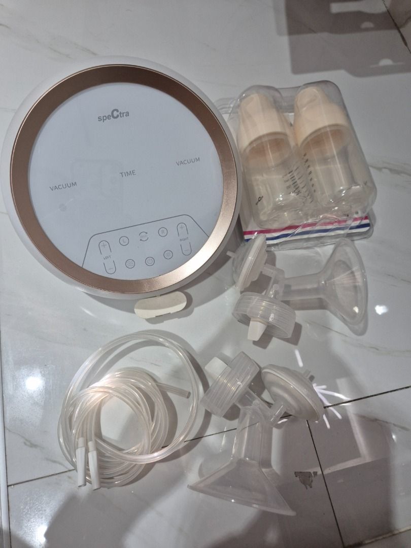 Spectra Dual S Electric Breast Pump (Category: Breastfeeding & Bottle Feeding) located in Pasig City. Submitted by ksantos12 (Listing ID 1438559599, Image 2). Description: FOR SALE: 2ND HAND SPECTRA - DUAL S HOSPITAL GRADE DOUBLE ELECTRIC BREAST PUMP With FREE 12 pcs Lansinoh Breastmilk Bag Included in the Box: - Spectra Breast Pump - Spectra Charger - Spectra Wide Neck Bottles (BRAND NEW, Unused) - Spectra Valves, Flanges and Backflow Protector 