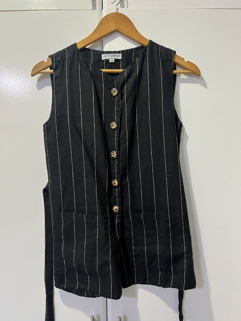Striped Vest and Skirt Set (Category: Sets or Coordinates) located in Makati City. Submitted by jcc999 (Listing ID 1438573993, Image 3). Description: Stylish black and white striped vest and skirt set. The vest features a button-up design and a flattering fit. The skirt has a zipper closure. Perfect for a chic and coordinated look. Great for both casual and semi-formal occasions. A versatile addition to any wardrobe. Fits small to medium size 32-