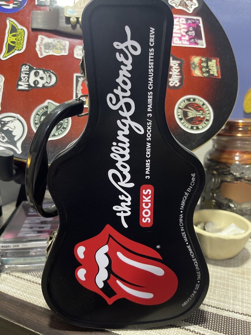 The Rolling Stones 3-Pair Crew Socks (Category: Socks) located in Cabuyao City. Submitted by jnnyz (Listing ID 1438629314, Image 1). Description: - Rolling Stones crew socks (3 pairs) - Features the iconic tongue logo - Comes in a guitar-shaped tin case - Fits men's shoe sizes: - US 7-12 - UK 6.6-11 - EU 40-46.