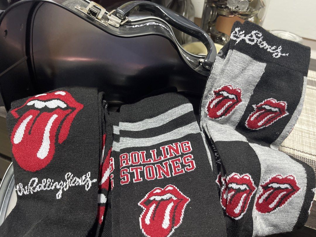 The Rolling Stones 3-Pair Crew Socks (Category: Socks) located in Cabuyao City. Submitted by jnnyz (Listing ID 1438629314, Image 2). Description: - Rolling Stones crew socks (3 pairs) - Features the iconic tongue logo - Comes in a guitar-shaped tin case - Fits men's shoe sizes: - US 7-12 - UK 6.6-11 - EU 40-46.